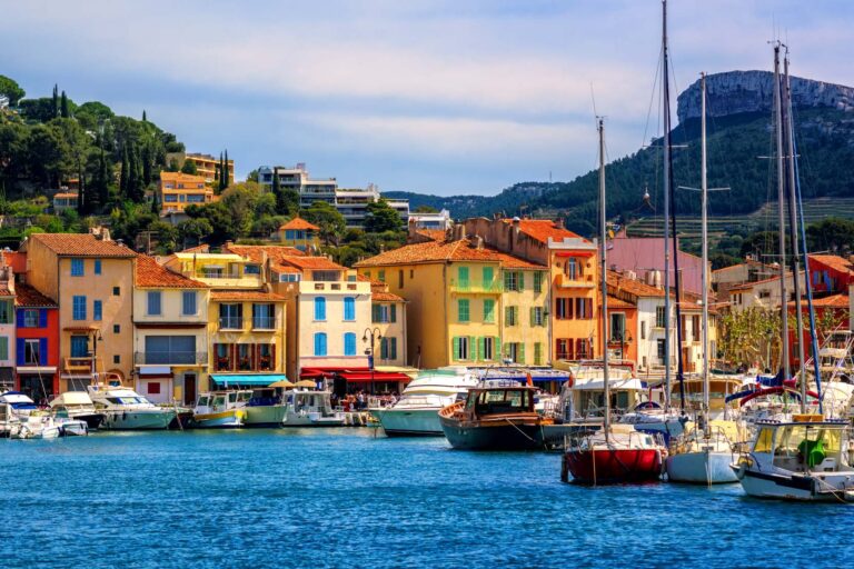 Colorful houses lining the seaport in Cassis, France