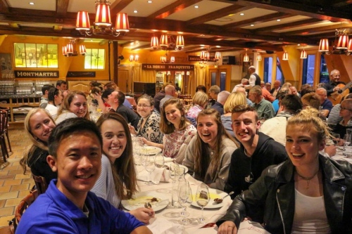 High School French Exchange students at dinner