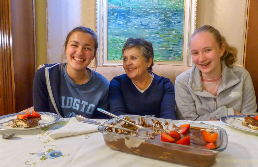 Nina and Host students enjoying dessert