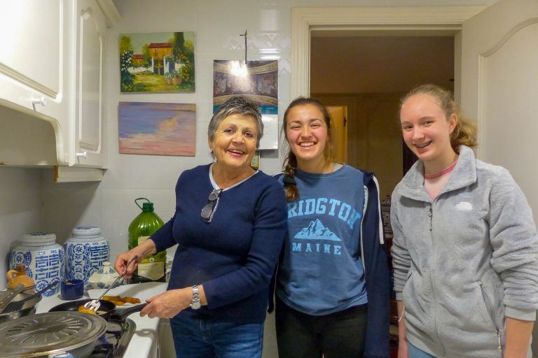 Host mom Nina in kitchen with students, Málaga, Spain