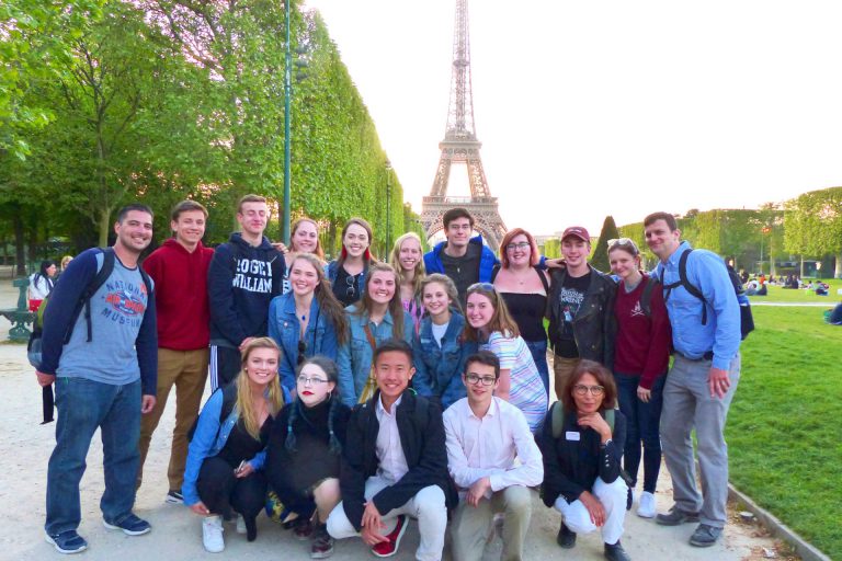 French exchange group in front of Eiffel Tower
